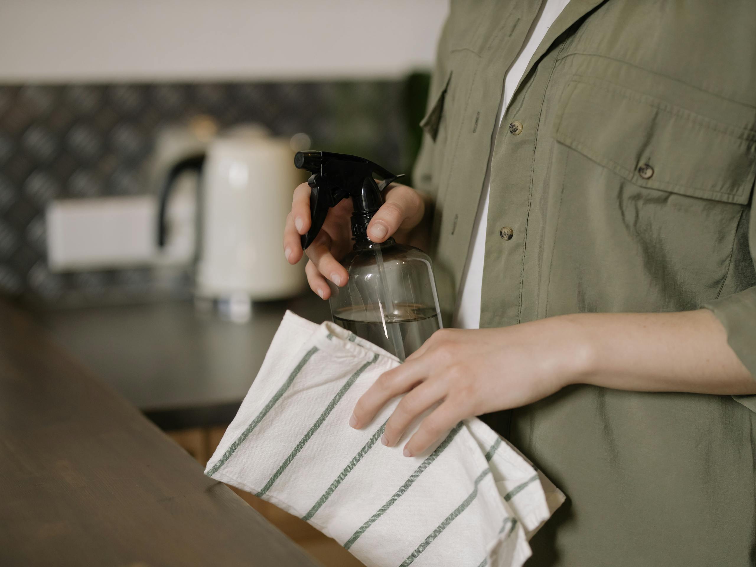 Detailed kitchen cleaning during a property reset